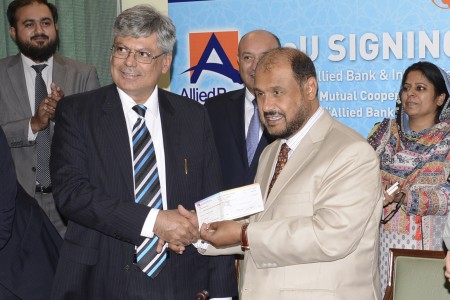 Director Allied Bank presenting 4 Milion to IIUI